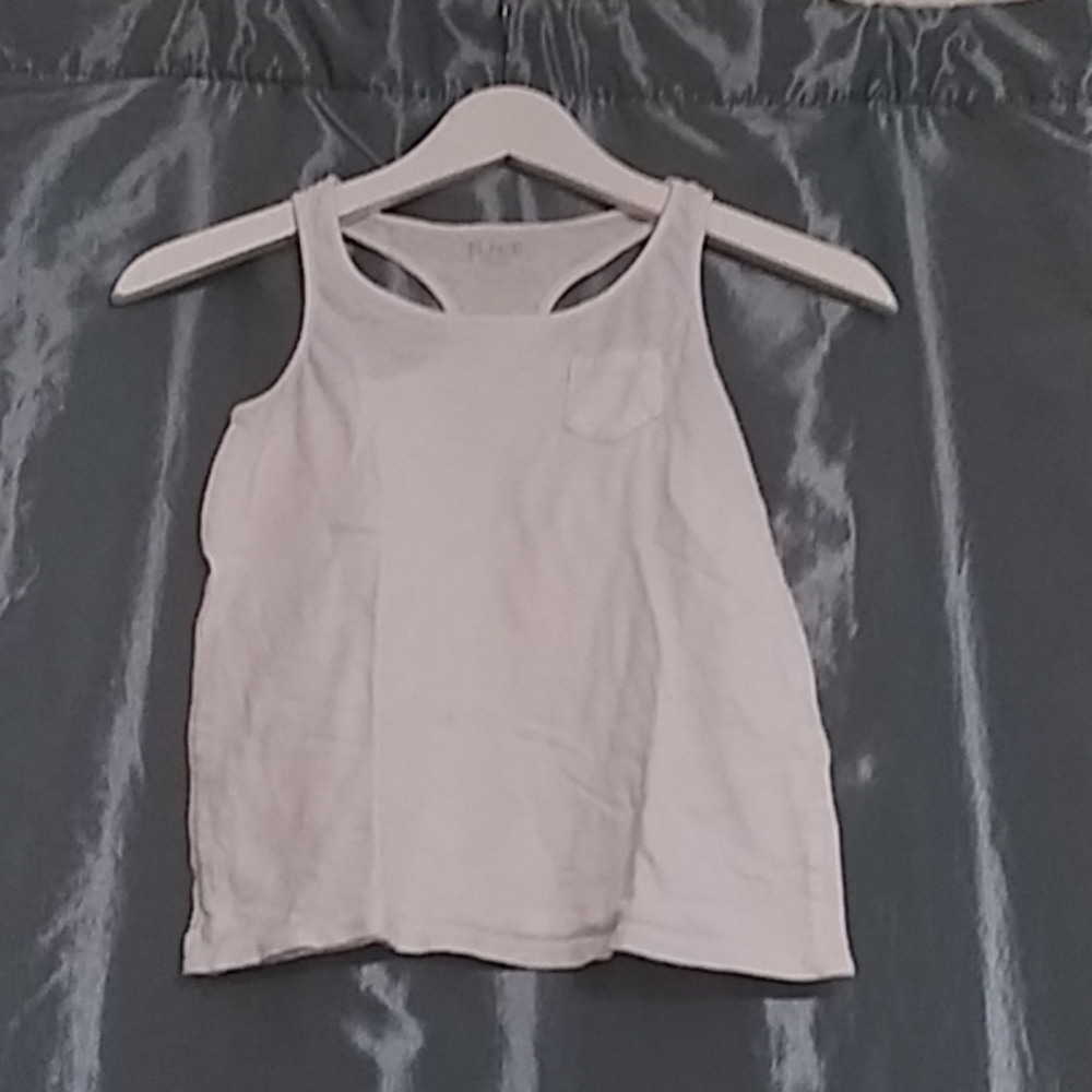 A girls white tank top